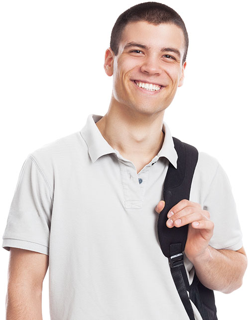 Male college student smiling holding a backpack