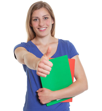 Female student giving the thumbs up