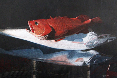 Painting of a red fish on a table