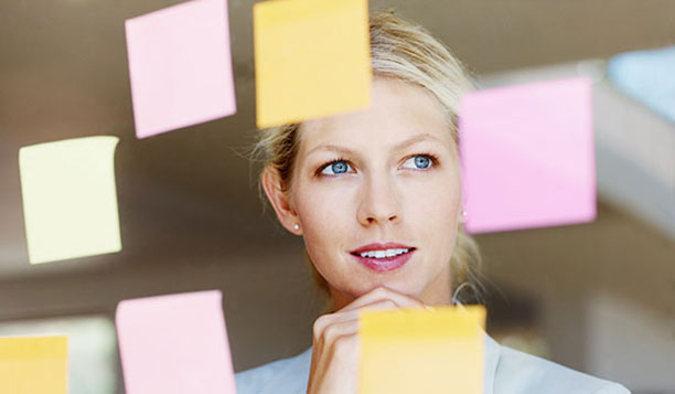 Person studying stick notes