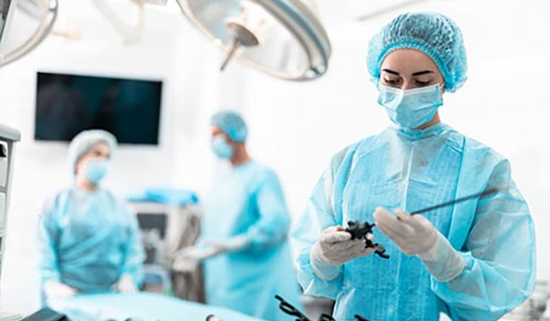 Surgical technologist in a surgery room