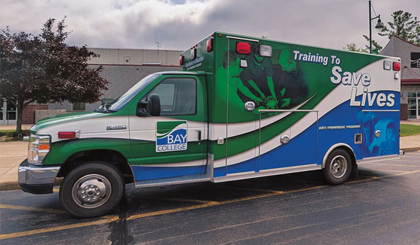 The Bay College EMT/Paramedic program ambulance, parked in front of the Bay College Iron Mountain campus. The college’s expanded Emergency Medical Services (EMS) programs begin Fall 2025.