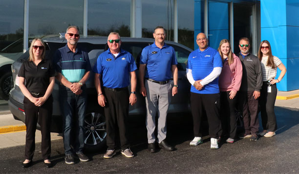 Bay College staff and Riverside Chevy employees