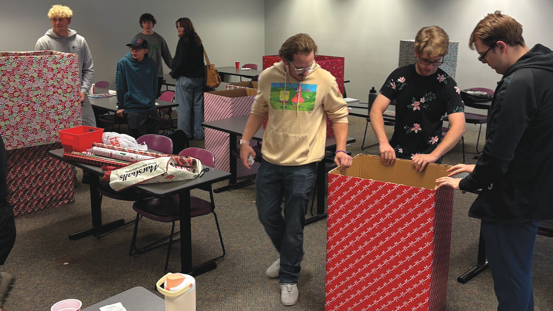 Bay/LSSU BPA students and boxes from 2025 Warm Coats for Warm Hearts campaign.
