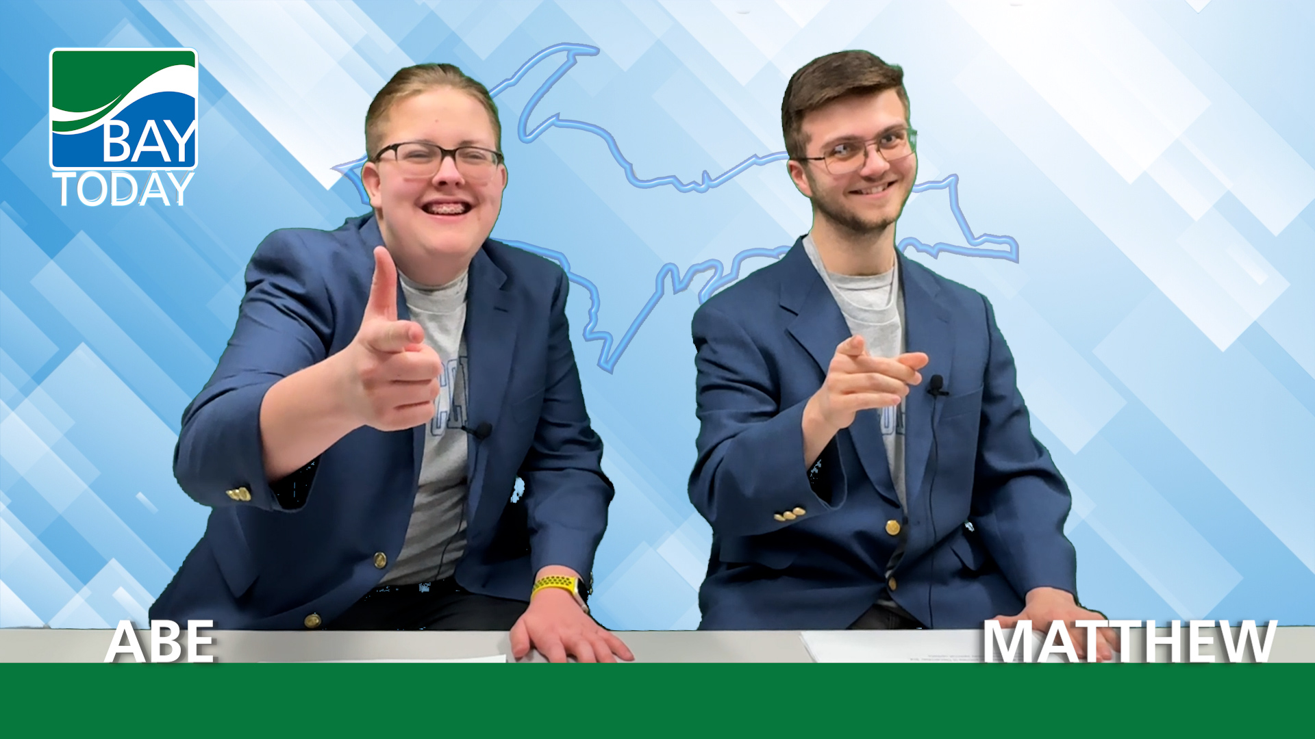 Bay Today Anchors Abe Wessel and Matthew Keast give a thumbs up during a special update in their Bay Today blue blazers.