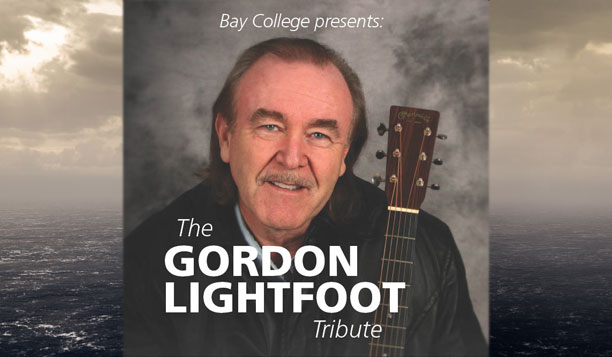 Tribute artist Mike Fornes with his guitar.