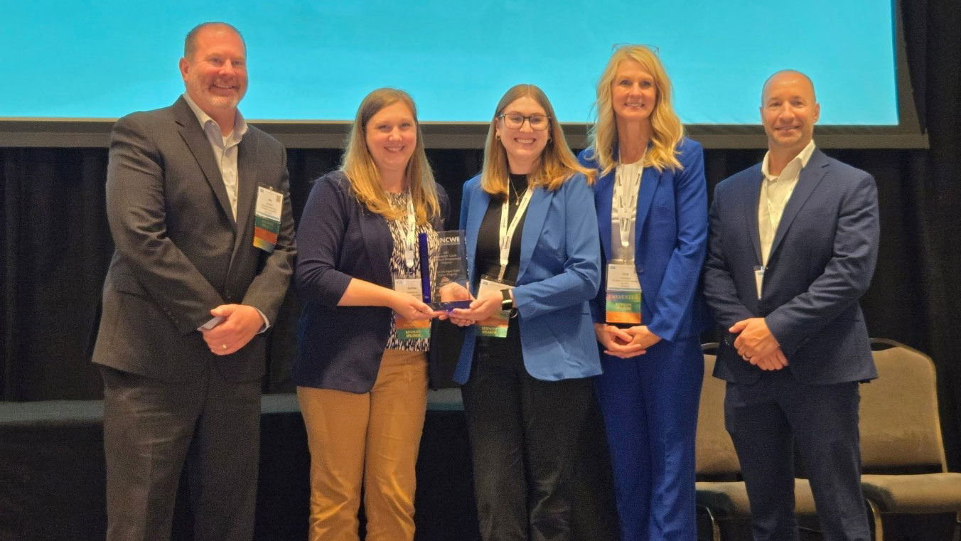 Bay College and Grand Rapids Community College team members accept the 2025 National Council for Workforce Education Exemplary Workforce Credit Award.