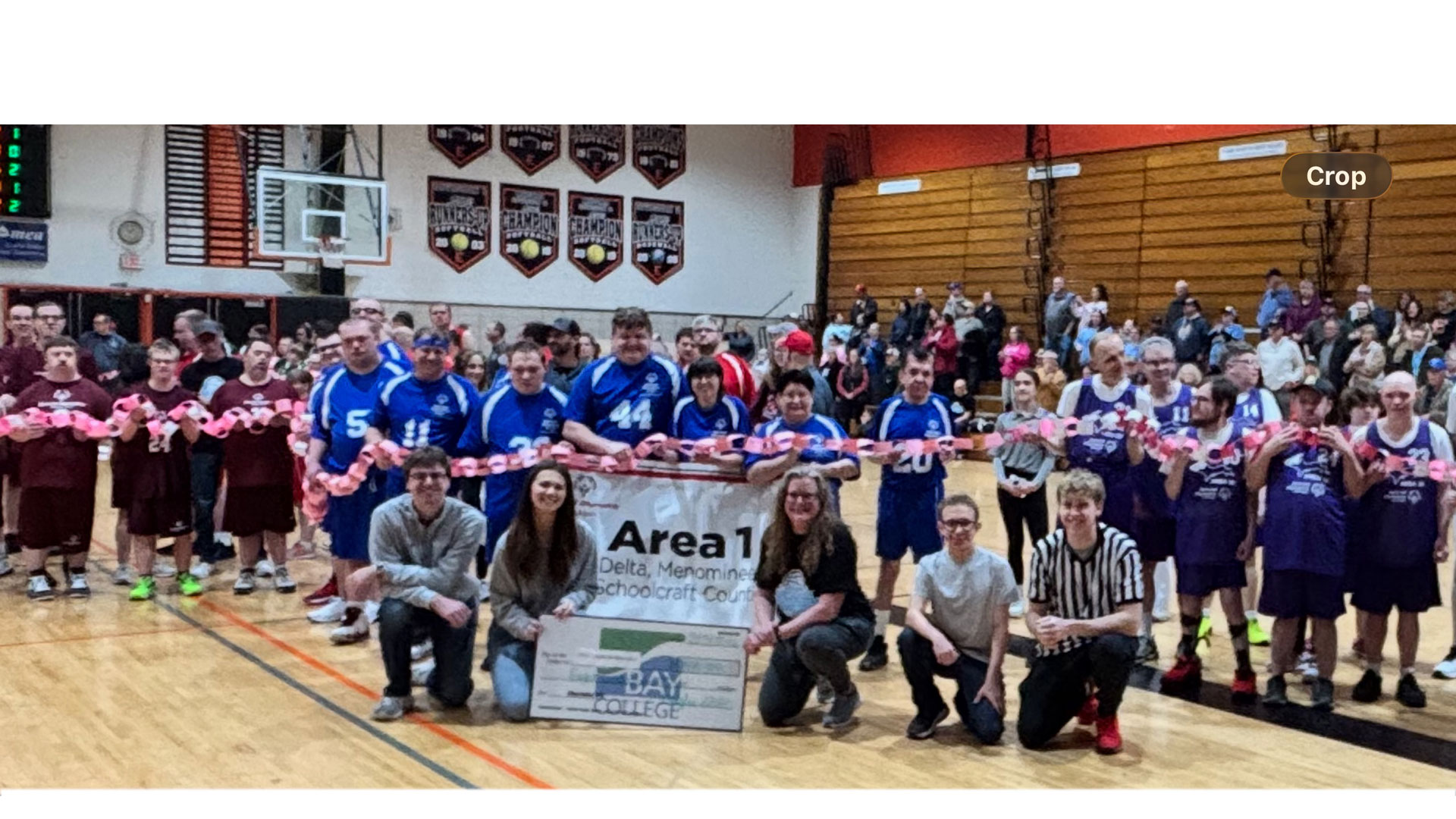 BPA President Gabriel Viau, COL Champion and BPA Treasurer Haylee Gatien, Wyatt Groleau, and Hunter Robinson present Special Olympics Director Becky Carey an $800 donation to the Local Area 1 Special Olympics program. The Special Olympians hold all 800 links made from the Chain of Love fundraiser.
