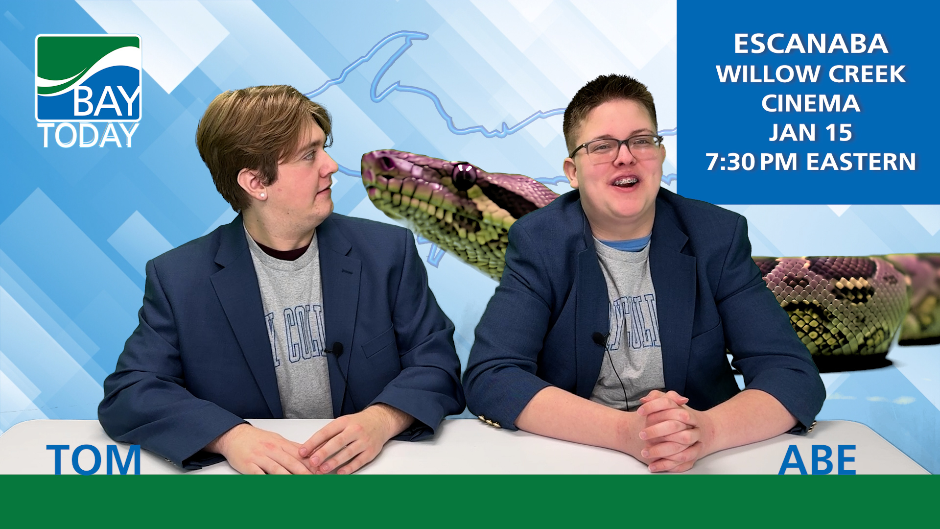Bay Today Anchors Tom Kluka and Abe Wessel encounter a CGI giant snake while reading the news.