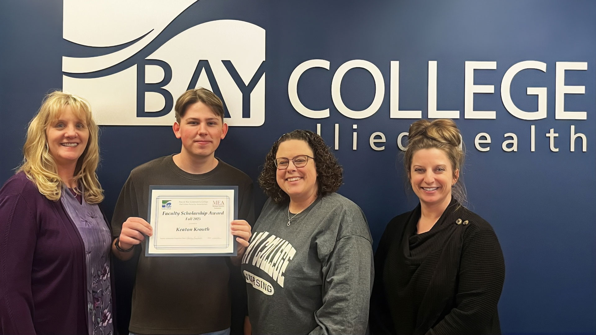 Pictured from left to right: Molly Campbell, MEA Faculty Association Scholarship Committee Chair; Keaton Krouth, scholarship recipient; Jennifer Farnsworth, MEA Faculty Association Scholarship Committee Chair; Christina Reed, Nursing Faculty.