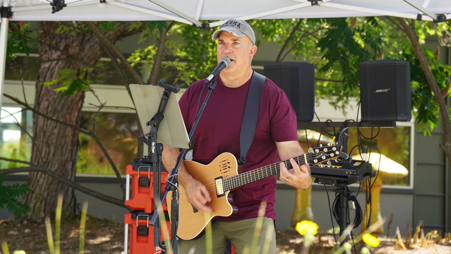 Local U.P. Musician George Sailor performs on his acoustic guitar at the Bay College Escanaba campus in July of 2025.
