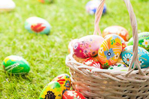 Easter egg basket on the grass