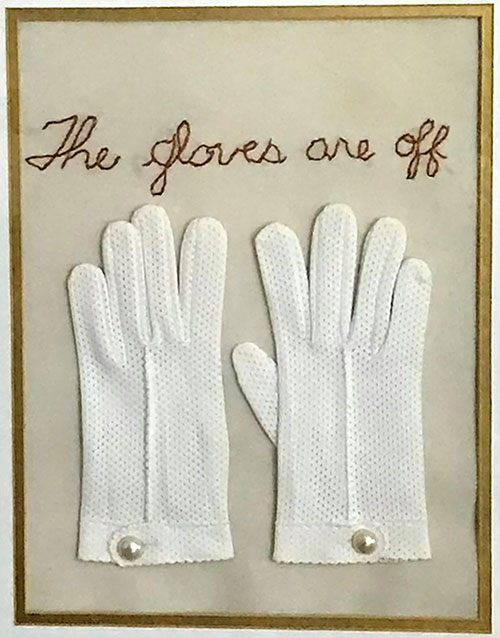 pair of white knit gloves