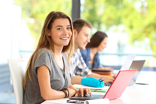 Female student using a laptop