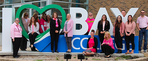 Bay College employees host a Pink Out day in support of Breast Cancer Awareness
